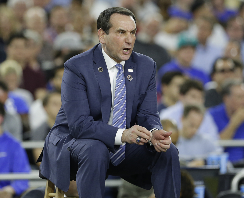 Illustration for article titled Eight Photos Of Coach K Sitting On A Lil' Stool